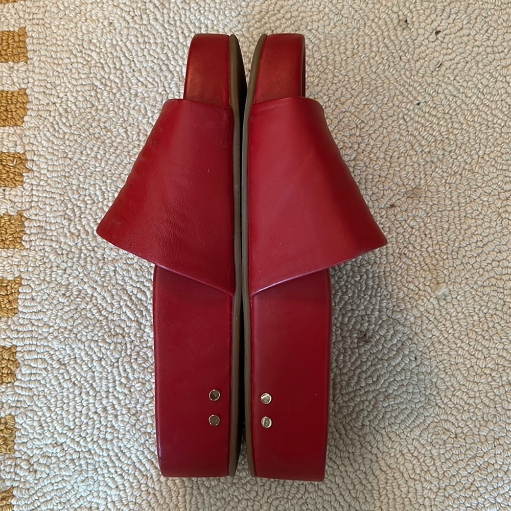 Been Pelican platform leather slides.